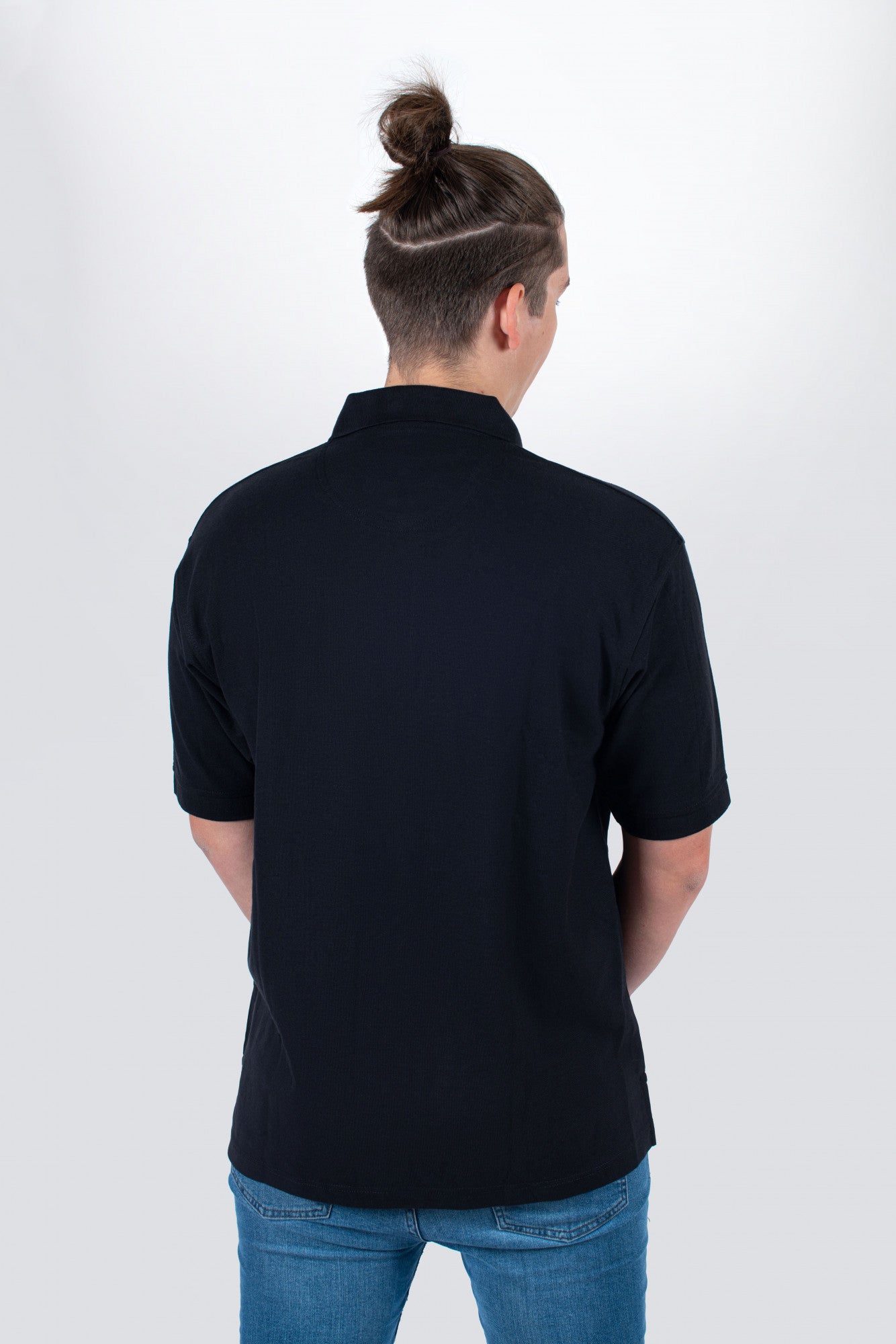 Tama black polo with embroidered logo on chest