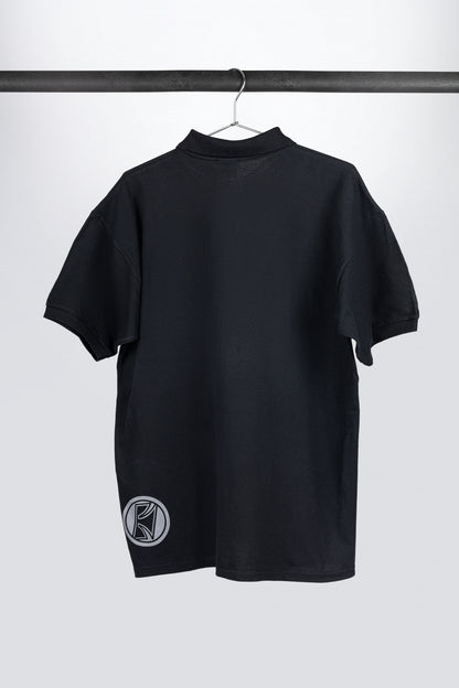 Tama polo in black with logo on left chest