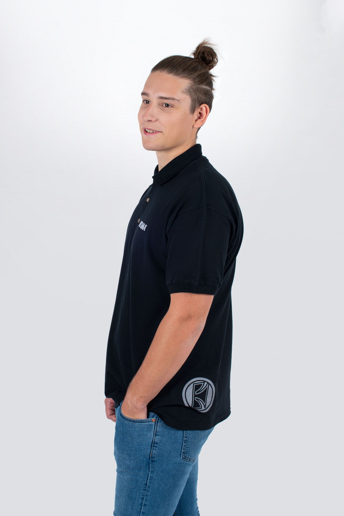 Tama polo in black with logo on left chest
