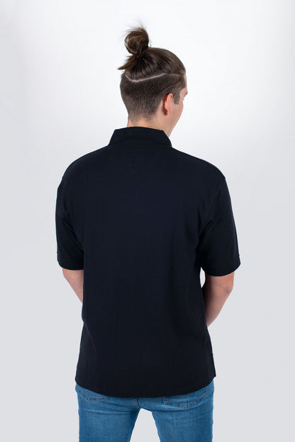 Tama black polo with embroidered logo on chest