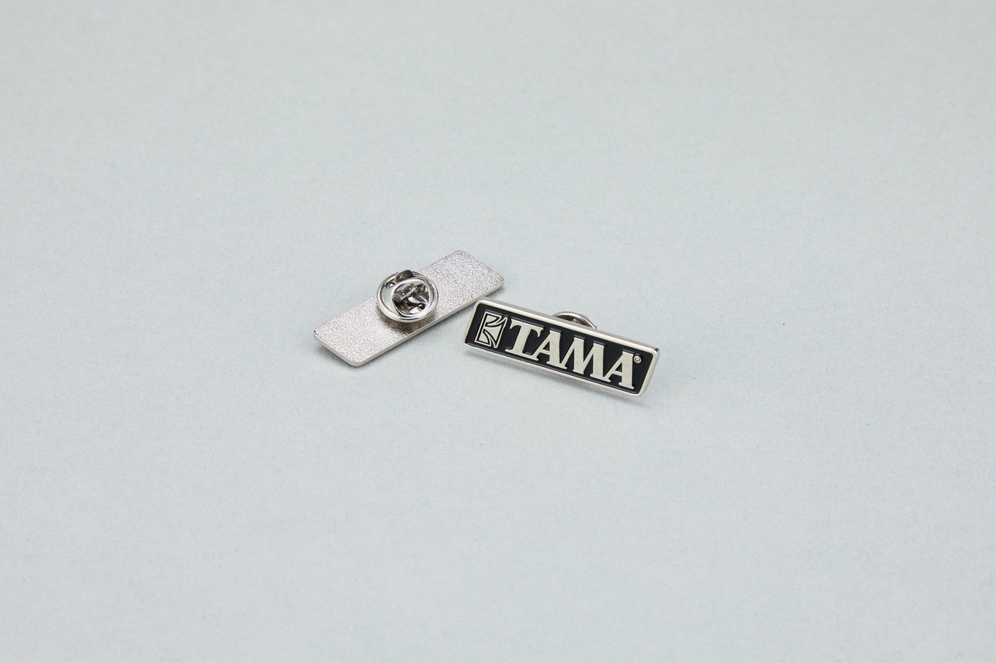 TAMA Logo Pin - Nickel Plated Brass