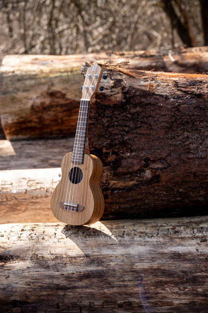 ORTEGA Timber Series Soprano Ukulele 4 String - Zebrawood Natural + Bag